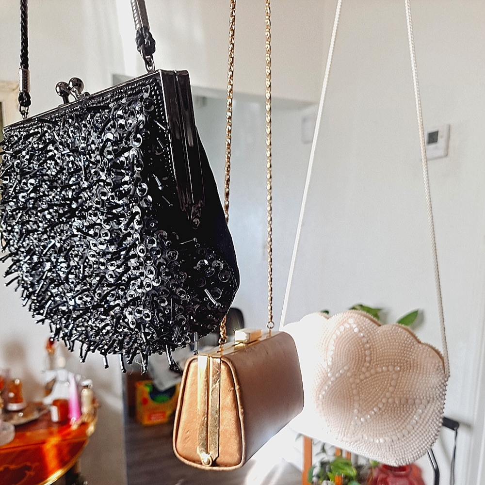 Beautiful clutches to go with whatever your going out in they're in excellent co